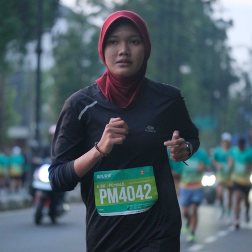 Race photo from BAUR RUN 2025
