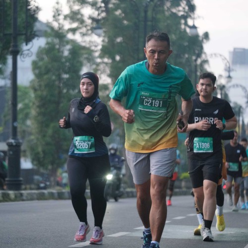 Race photo from BAUR RUN 2025