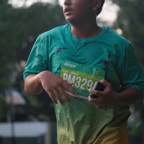 Race photo from BAUR RUN 2025