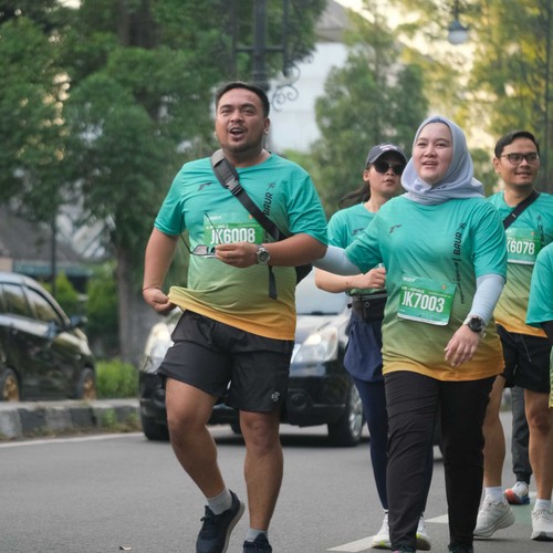 Race photo from BAUR RUN 2025