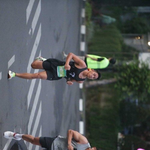 Race photo from BAUR RUN 2025
