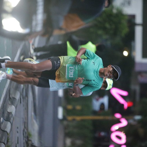 Race photo from BAUR RUN 2025