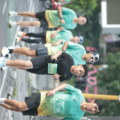 Race photo from BAUR RUN 2025