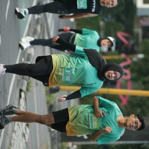 Race photo from BAUR RUN 2025