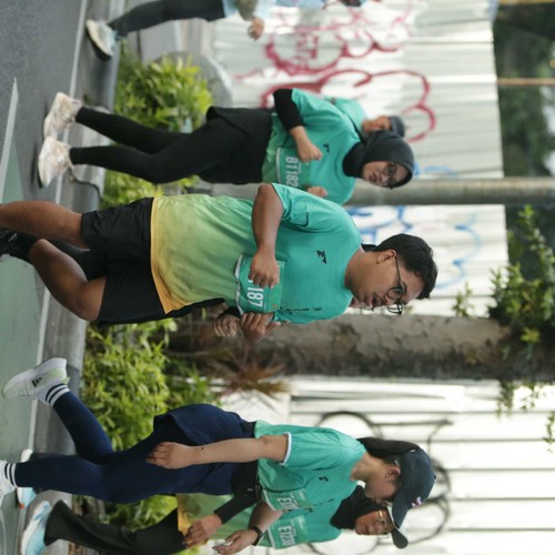 Race photo from BAUR RUN 2025
