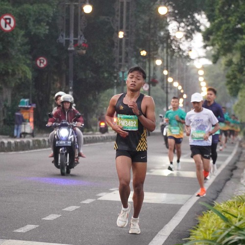 Race photo from BAUR RUN 2025