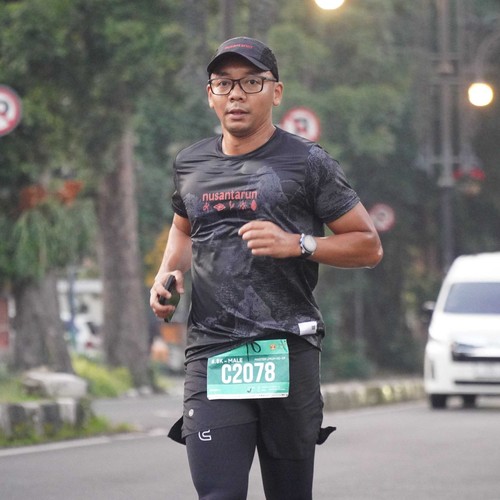 Race photo from BAUR RUN 2025