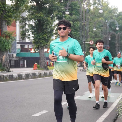 Race photo from BAUR RUN 2025