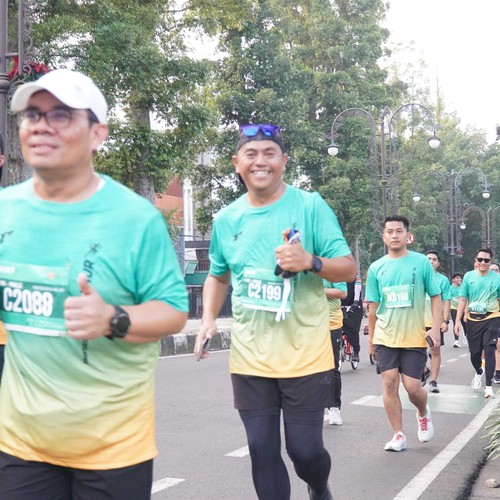 Race photo from BAUR RUN 2025