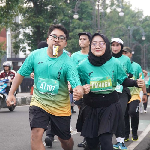 Race photo from BAUR RUN 2025