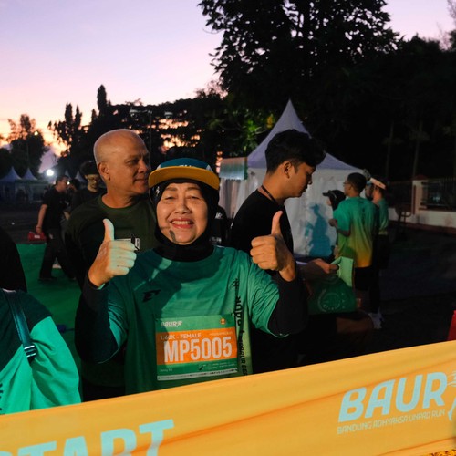 Race photo from BAUR RUN 2025