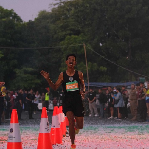 Race photo from BAUR RUN 2025
