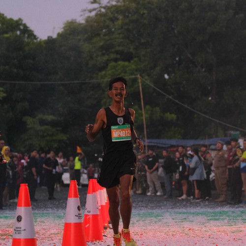 Race photo from BAUR RUN 2025