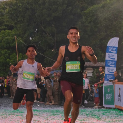 Race photo from BAUR RUN 2025