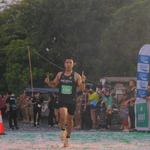 Race photo from BAUR RUN 2025