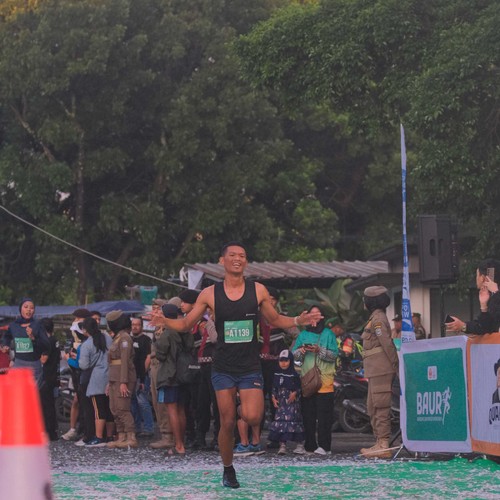 Race photo from BAUR RUN 2025