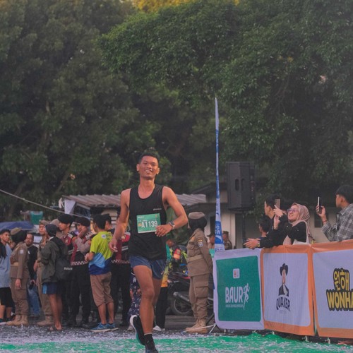 Race photo from BAUR RUN 2025