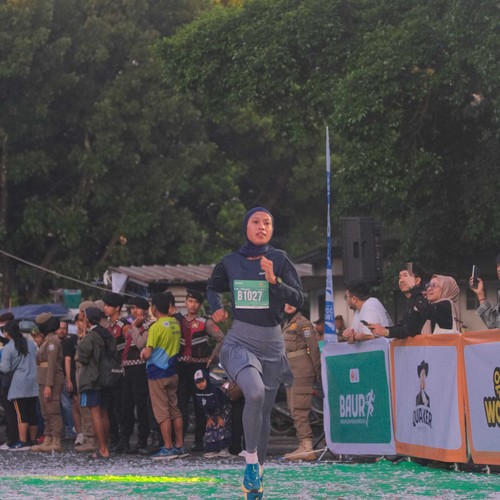 Race photo from BAUR RUN 2025