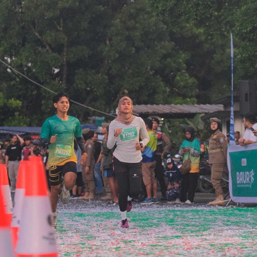 Race photo from BAUR RUN 2025