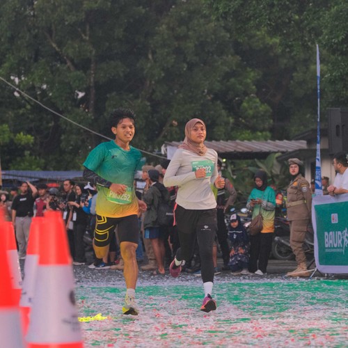 Race photo from BAUR RUN 2025