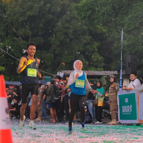 Race photo from BAUR RUN 2025