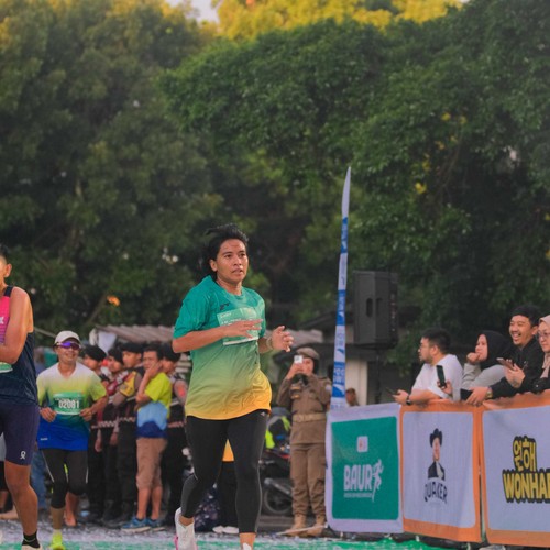 Race photo from BAUR RUN 2025