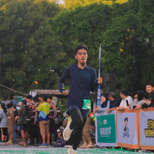 Race photo from BAUR RUN 2025