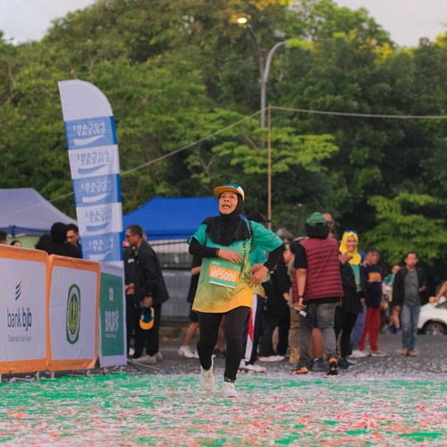 Race photo from BAUR RUN 2025