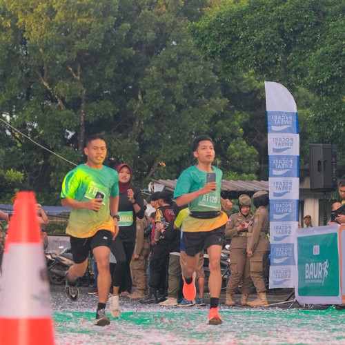 Race photo from BAUR RUN 2025