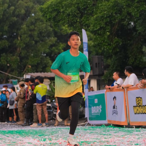 Race photo from BAUR RUN 2025