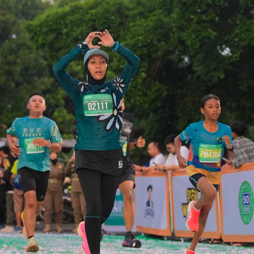 Race photo from BAUR RUN 2025