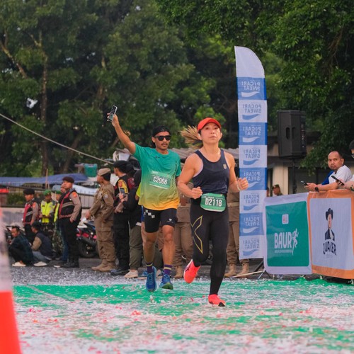 Race photo from BAUR RUN 2025
