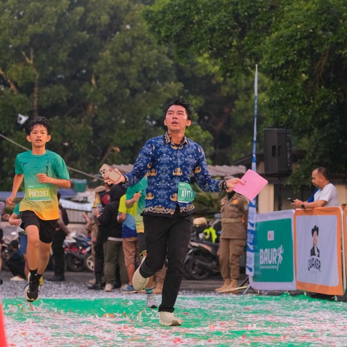 Race photo from BAUR RUN 2025