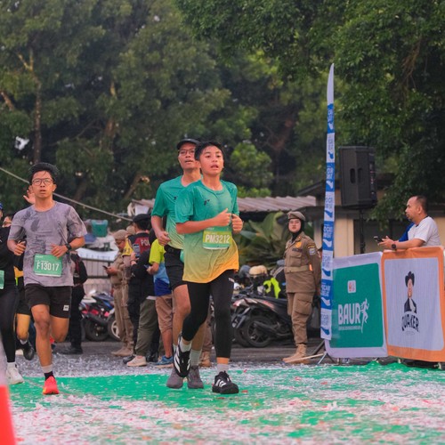 Race photo from BAUR RUN 2025