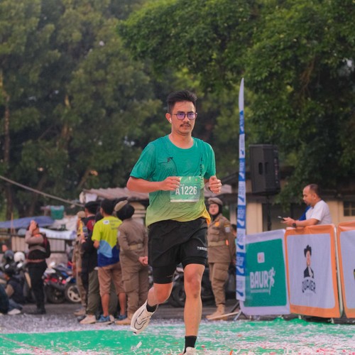 Race photo from BAUR RUN 2025