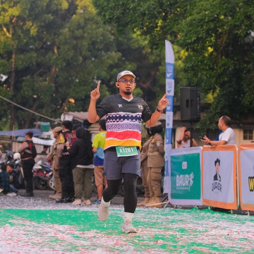 Race photo from BAUR RUN 2025