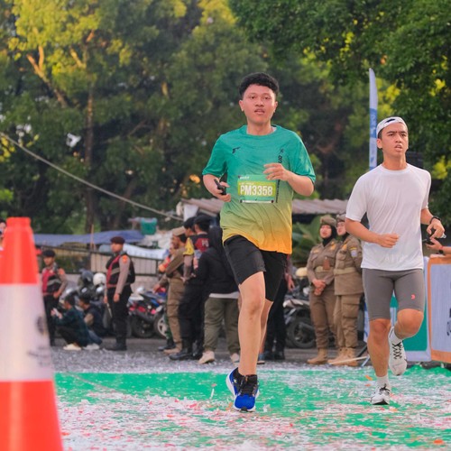 Race photo from BAUR RUN 2025