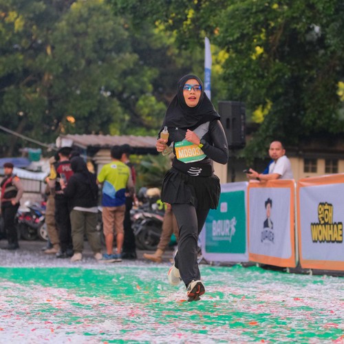 Race photo from BAUR RUN 2025