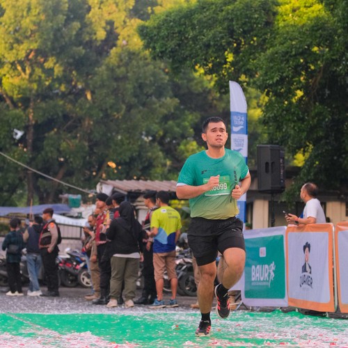 Race photo from BAUR RUN 2025
