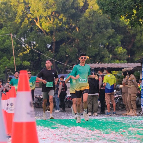 Race photo from BAUR RUN 2025