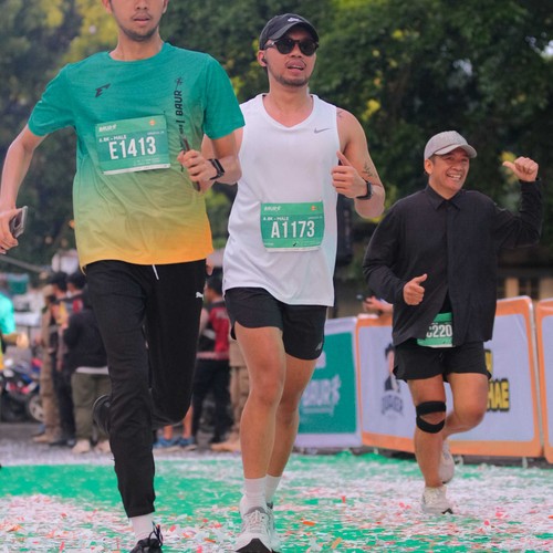 Race photo from BAUR RUN 2025