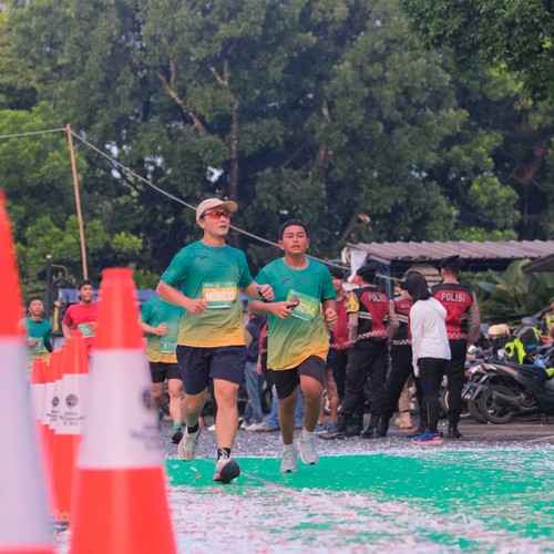 Race photo from BAUR RUN 2025