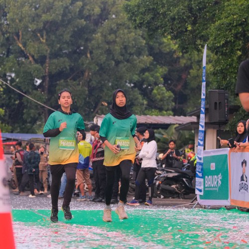 Race photo from BAUR RUN 2025