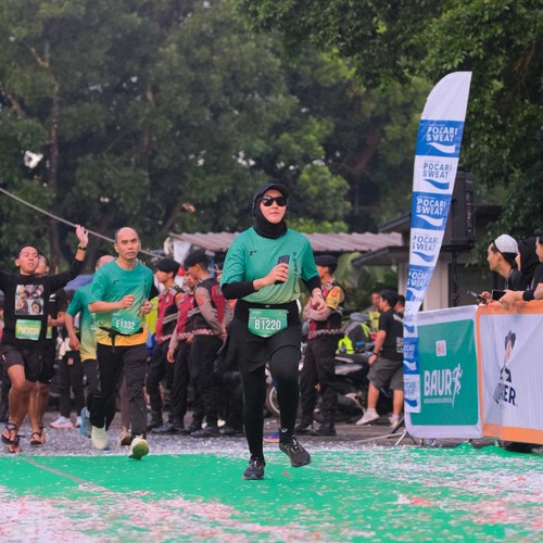 Race photo from BAUR RUN 2025