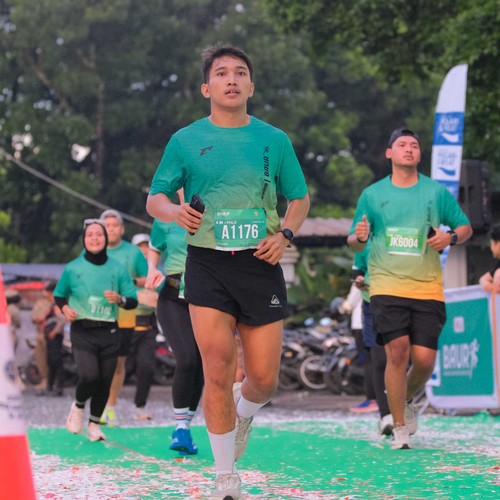 Race photo from BAUR RUN 2025