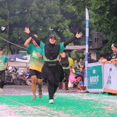 Race photo from BAUR RUN 2025