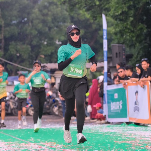 Race photo from BAUR RUN 2025