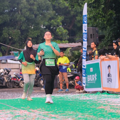 Race photo from BAUR RUN 2025