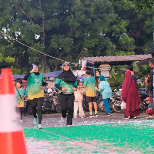 Race photo from BAUR RUN 2025