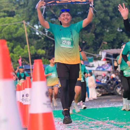 Race photo from BAUR RUN 2025